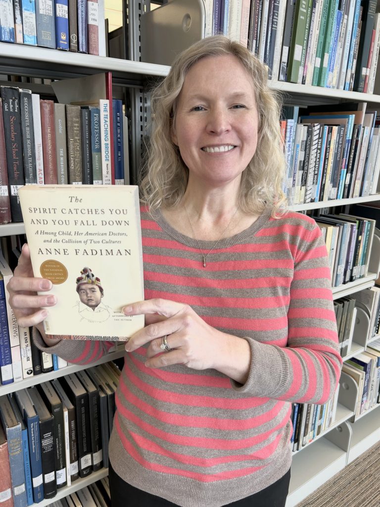 Ruth Connell holding The Spirit Catches You and You Fall Down : a Hmong Child, her American Doctors, and the Collision of Two Cultures,” by Anne Fadimann
