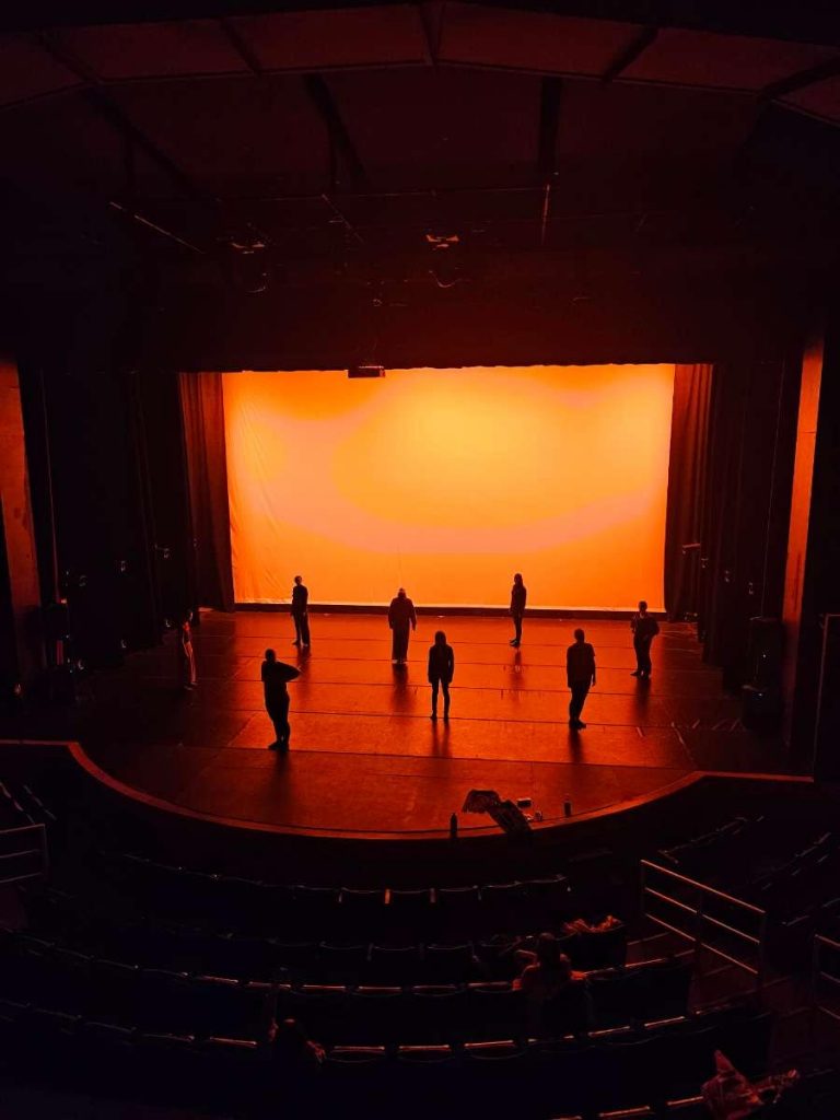 Dance Ensemble rehearsal on stage.