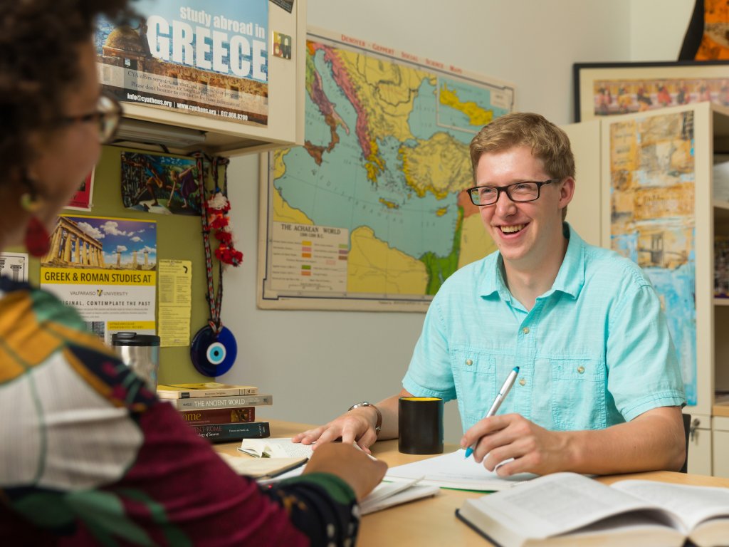 student talking to a teacher