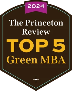 Badge reading "2024 The Princeton Review TOP 5 Green MBA" in bold white and yellow text on a dark shield, highlighting excellence in MBA sustainability.