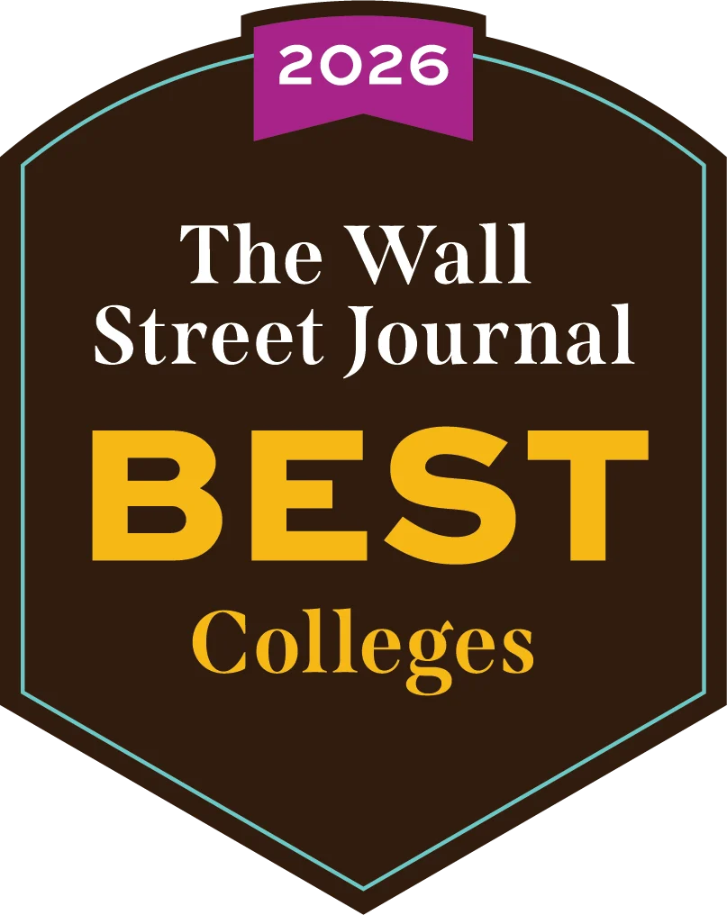 About: A badge reading "2026 The Wall Street Journal Best Colleges" on a dark background.