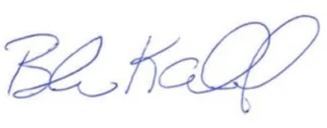 A blue handwritten signature with cursive, flowing letters on a white background.