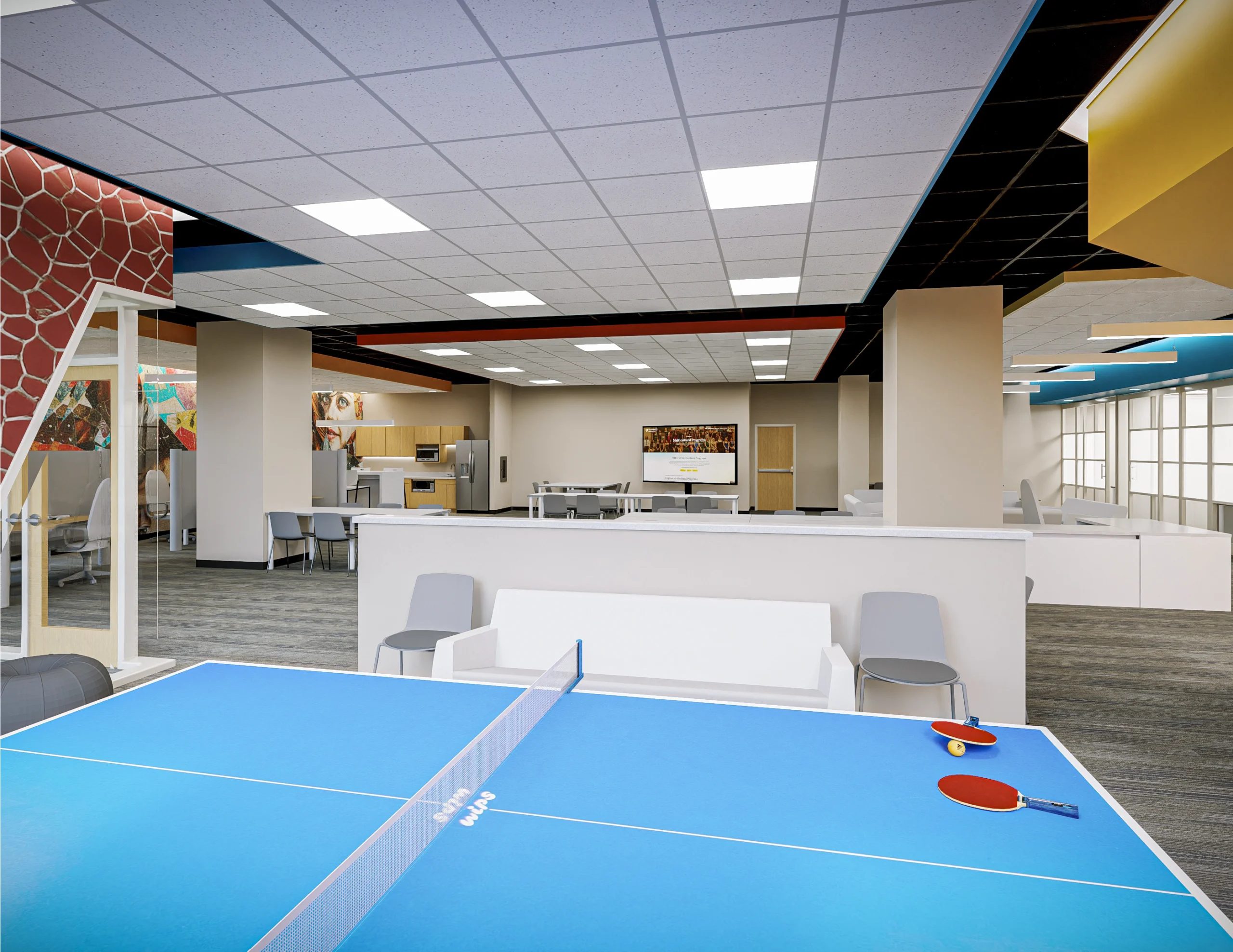 A modern recreation room in Loke Hall with a blue ping pong table, inviting seating areas, and bright decor.