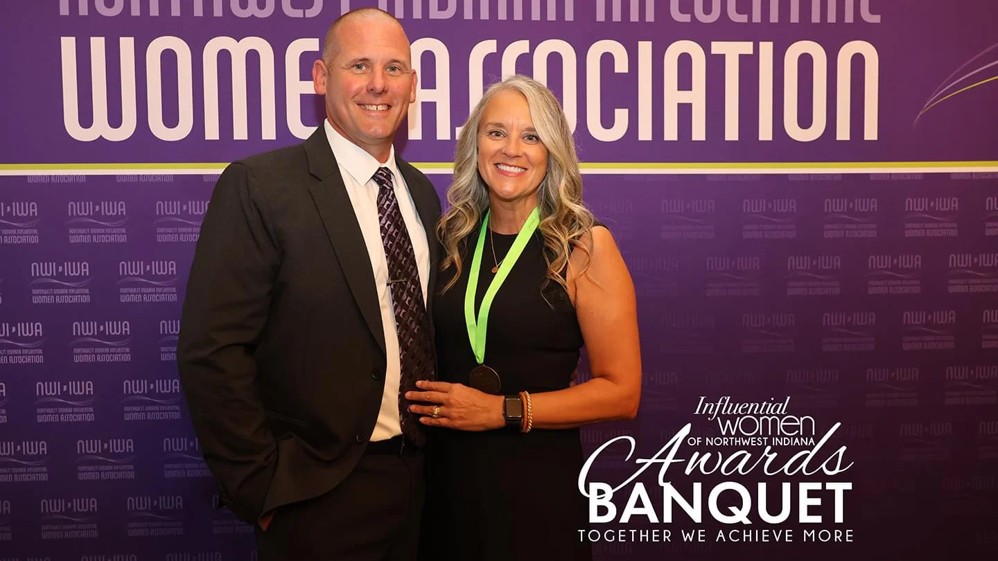 Katie Adrian Jasnieski and a companion smile as they pose at the Influential Women Awards Banquet in Northwest Indiana, celebrating local Beacon leaders.