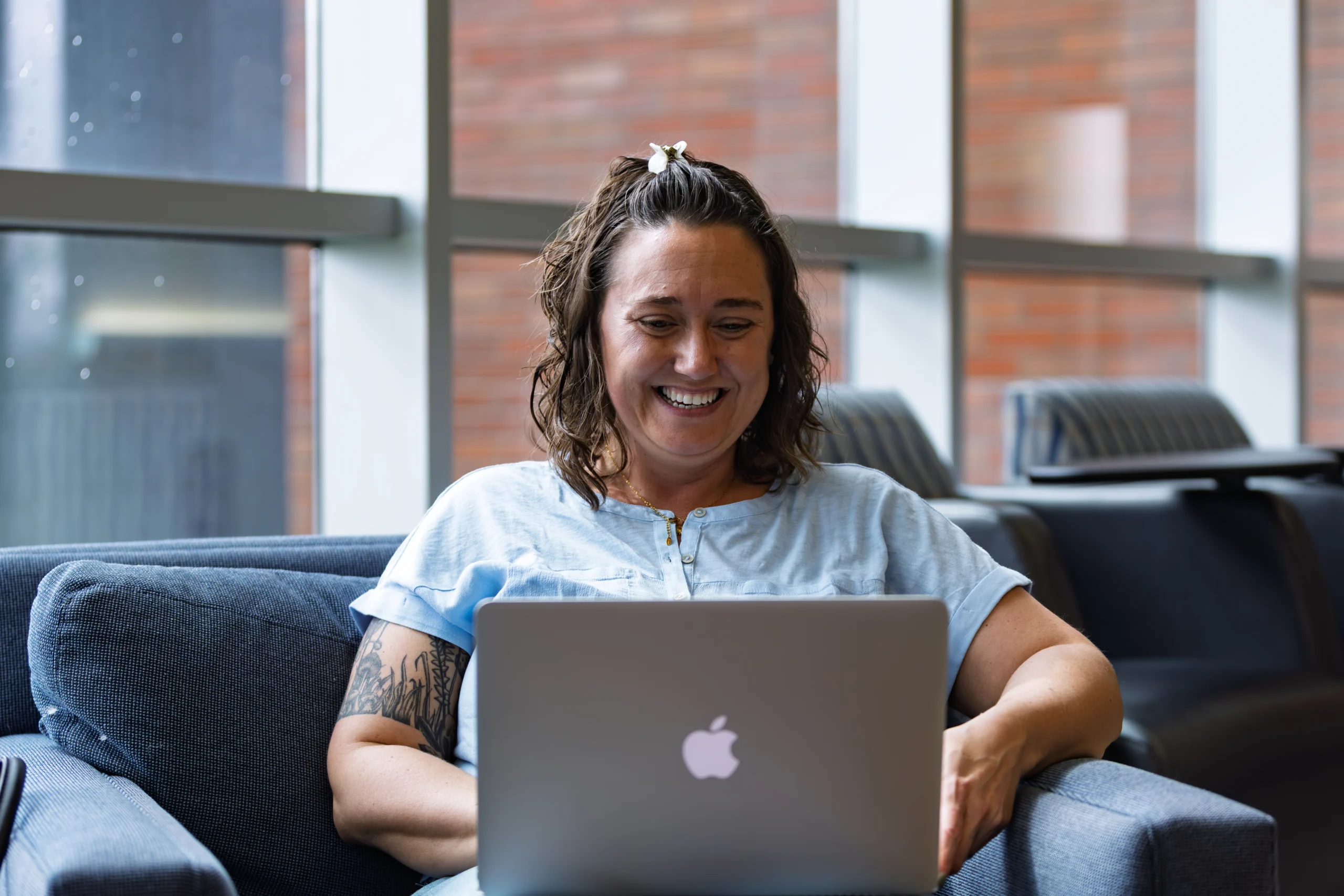 Online Valpo Graduate student working on laptop.