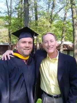 Masters grad with Homer Drew